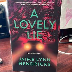 A Lovely Lie by - Black and Red Cover